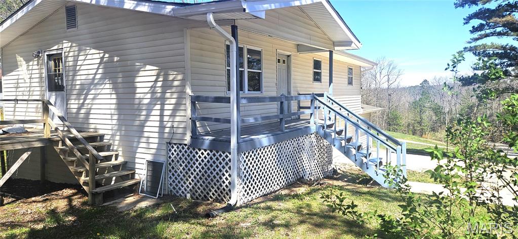Updated 3-bed/3-bath home in town featuring new flooring, paint, plumbing, gutters, appliances, and fully refreshed bathrooms. Enjoy a large eat-in kitchen with a new moveable island and stainless appliances that stay. Partial basement has new paint, ceiling tiles, and lighting. Exterior upgrades include Leaf Filter gutters, treated siding, and foundation, fascia, and soffit repairs — all with warranties. Property offers a tuck-under garage plus a storage garage. Close to Clearwater Lake, the Current River, Jack’s Fork, and the Black River. Move-in ready and fully updated.