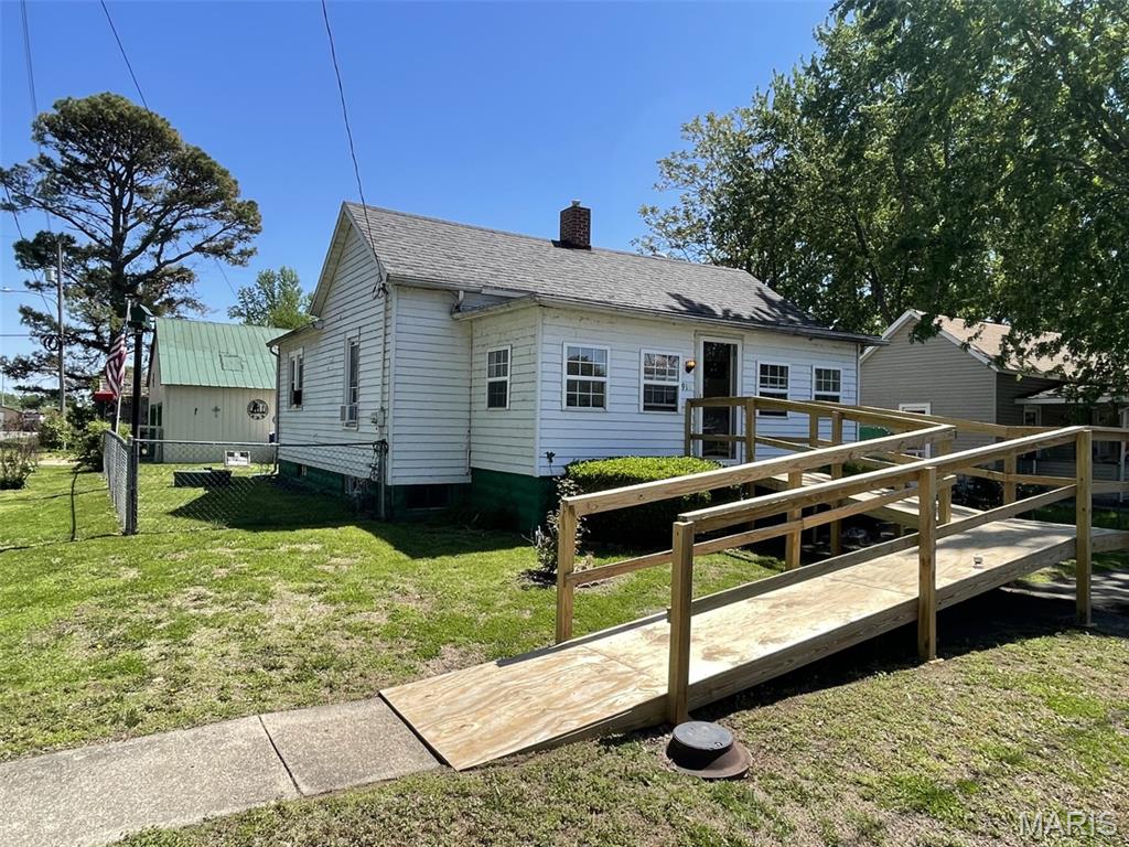 If you are looking for an amazing vacation home just two blocks from Carlyle Lake, you will love the features of this home!  This home would be perfect as a weekend getaway or your own private residence!  If you love fishing, boating, and the lake life, you have found the one!  This home has been well cared for and features a spacious living room, two bedrooms on the main floor, and a cozy updated white kitchen.  In the backyard, you will find a large fenced yard, perfect for your pets and a spacious storage garage perfect for storing your boat or cars and also features a camper hookup as well!  The lower level features some additional living area as well.  Come take a look today...this home wont last long! 
A/V recording on premises.