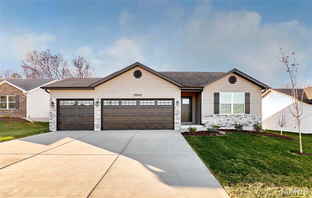 2 year NEW - 3Bed/2Bath RANCH with every option you could imagine! They include vaulted ceilings, rounded “bullnose” corners, granite or quartz countertops, stainless steel appliances, 42" cabinets with "cushion close", custom neutral-colored paint job throughout, LVT flooring throughout most of the home, framed windows, taller baseboards, adult-sized cabinets in bathrooms with marble countertops, walk-in closets, upgraded carriage garage doors with openers, full bath rough-in, panel doors, and upgraded water/light fixtures throughout the house! MAIN FLOOR laundry! Tenant to verify school districts as Wentzville is constantly changing. Agent Owner.