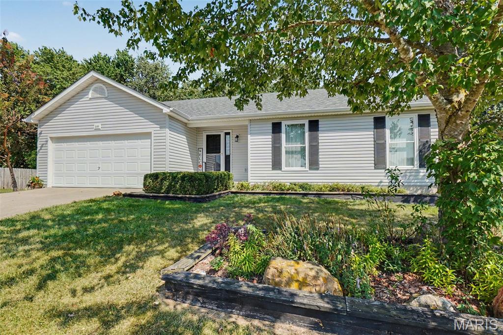 Located in a peaceful cul-de-sac just 2 miles from Warrenton, this 3-bedroom, 2-bath ranch offers comfortable one-level living with plenty of room to grow. The main level features a spacious 15 x 19 great room with vaulted ceilings, a kitchen with pantry and adjoining breakfast room, three bedrooms, and two full baths. The full basement provides additional space and excellent potential for future finishing, storage, recreation, or hobbies.

The primary bedroom offers generous space at 12 x 16, while the additional bedrooms provide flexibility for family, guests, or a home office. Tilt-in windows, electric forced air heating, central air, and a 2-car attached garage add everyday convenience. The home sits on a level lot with underground utilities and a setting that adjoins common ground and a wooded area.

Step outside to enjoy one of the property's favorite features: the large covered deck overlooking the backyard. There is plenty of room for outdoor entertaining, gardening, games, or simply relaxing while watching deer, rabbits, squirrels, and other wildlife. The covered deck provides a comfortable outdoor living space in nearly any season.

Tucked away from the hustle and bustle while remaining close to Warrenton, this home offers a great combination of space, privacy, and convenience. Located in the Warren County R-III School District and near the Warren County Health Department, Dollar General, and the new K-5 school. A well cared for home with room to make it your own.