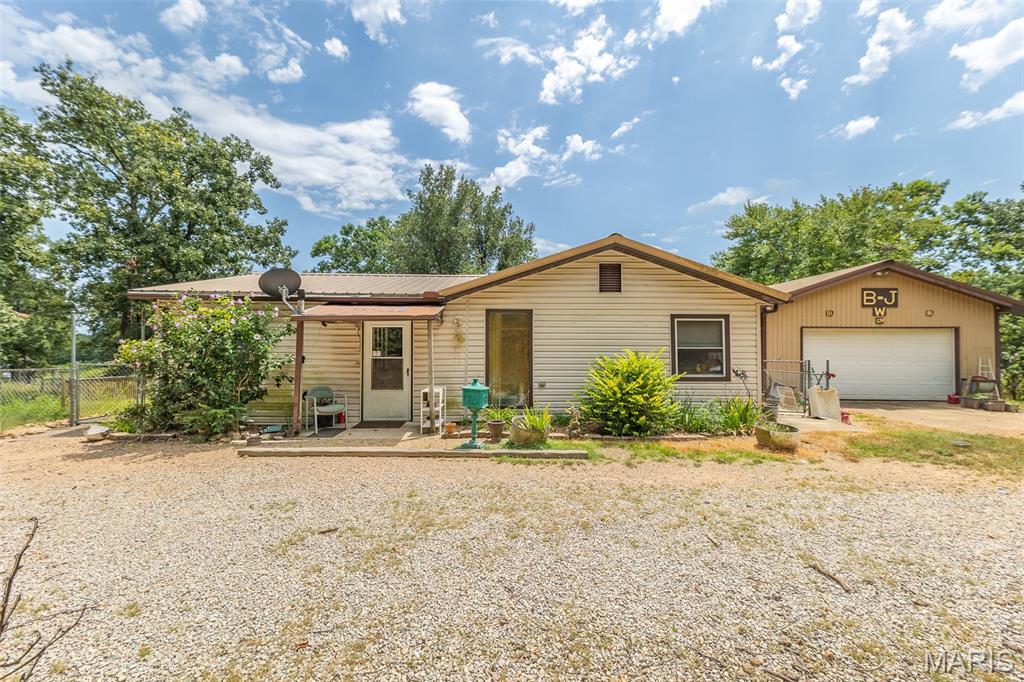 52 Carter 315, Ellsinore, Missouri 63937
27.11 acres +/- 
$325,000

Looking for a homestead? This versatile property might be for you!

1 bed, 1 bath home.
24x40 ft shop that is complete with a big garage door, electric, a bathroom with laundry hookups.
16x28 ft metal storage building with concrete floors and electric that offers many avenues for this building.
A carport and a well house
A good sized pole barn with pasture that is fenced and cross fenced, that is currently hosting sheep and chickens. 
Multiple water hydrants located throughout the property.
RV/Camper electric hookups. 

This property is ready for livestock, gardening or your next adventure!

Call today!