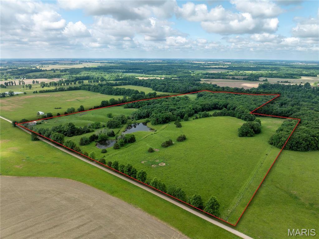Exceptional Farm & Recreational Property! This versatile property offers productive pasture ground that is fully fenced and cross-fenced, making it ideal for livestock operations. Multiple paddocks provide excellent grazing management opportunities, while automatic cattle waterers help ensure year-round convenience and efficiency. Two stocked ponds offers great fishing, additional water sources, and enhance the property's scenic appeal.

Water and electric service are already available on the property, providing a strong foundation for future improvements or agricultural use. A storage shed offers space for equipment, tools, and supplies.

Beyond its agricultural potential, this property is a true outdoor enthusiast's paradise. Excellent deer and turkey hunting opportunities abound, with a diverse landscape that attracts and supports abundant wildlife. Whether you're looking to expand your farming operation, establish a hobby farm, build your dream country retreat, or enjoy premier hunting and recreation, this property offers endless possibilities.

A rare combination of productive pasture, quality infrastructure, natural water features, and outstanding recreational value—all in one exceptional property. Don't miss this opportunity to own a beautiful piece of countryside with income potential and year-round enjoyment.