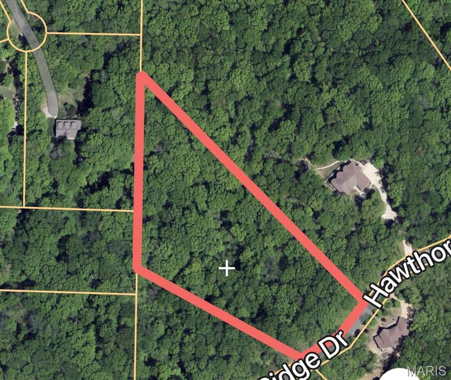 THE BLUFFS IS AN ESTABLISHED GATED COMMUNITY WITH  WOODED HILLTOP LOTS, AND DISTANT VIEWS 2 LAKES,CENTRAL SEWER, EXCELLENT ARCHITECTURAL CONTROL,ROCKWOOD SCHOOLS,GREAT VIEWS,ASPHALT STREETS,UNDERGROUND ELECTRIC, CORNERS ARE MARKED #39 IS IN ROCKWOOD SCHOOLS. THIS LOT HAS A WOODED VALLEY VIEW . 
THE BLUFFS IS A GATED COMMUNITY PLEASE CALL FOR ACCESS CODE