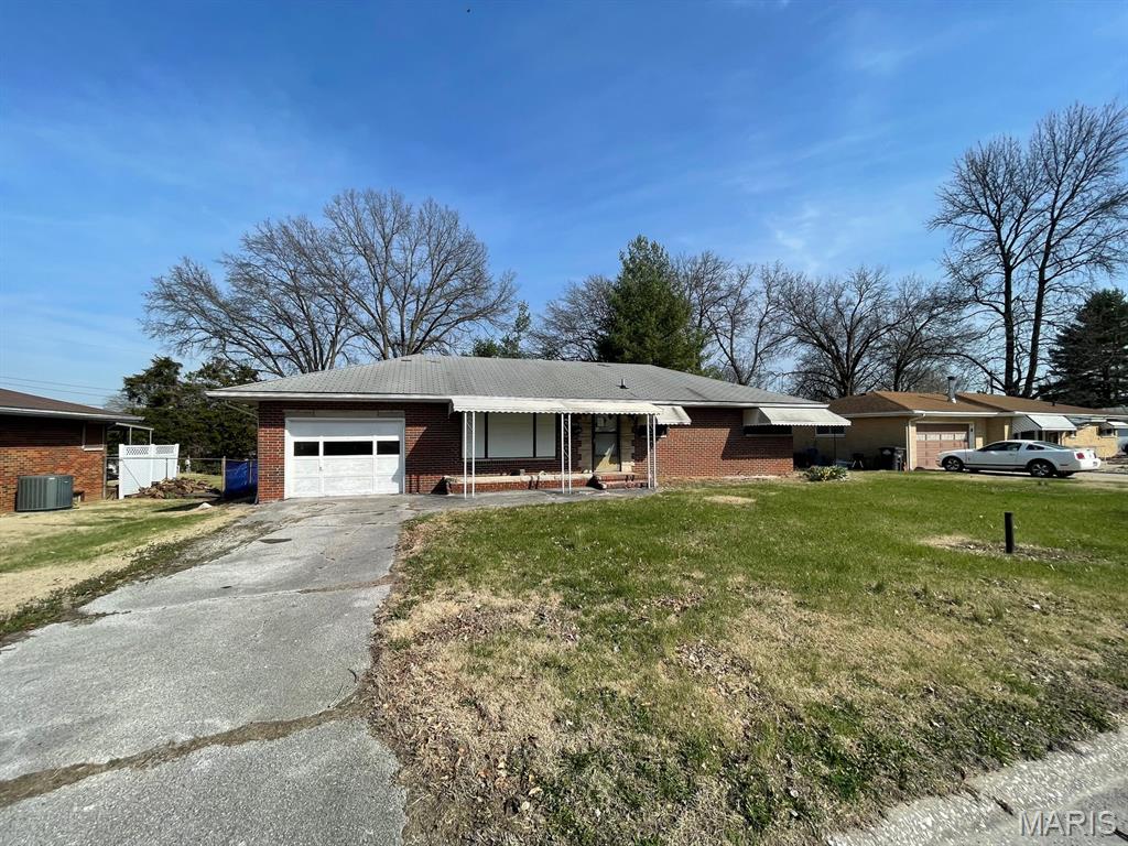 Ranch-style home located at 5205 Wick Way in Alton, offering a functional layout and desirable features for comfortable everyday living. This property includes three bedrooms and a spacious kitchen complete with a pantry, providing ample storage and workspace. The main level is designed for convenience, while the full basement offers additional storage or potential for future finishing to expand living space. Outdoor amenities include a covered patio, creating an ideal space for relaxing or entertaining, along with a yard suitable for a variety of uses. Situated in an established residential neighborhood, the property benefits from a quiet setting with easy access to shopping, dining, and everyday conveniences. Homes in this area are typically located near community amenities and offer a balance of suburban comfort and accessibility. ALL information is deemed reliable but is not guaranteed and should be verified by the buyer and/or buyers agent before making an offer.