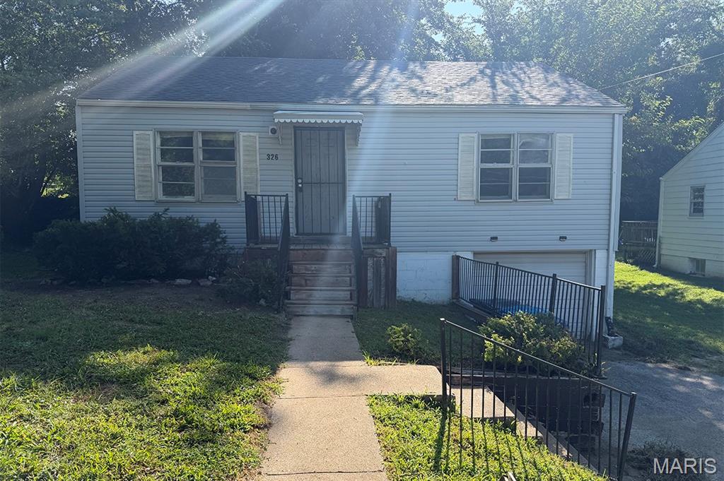 Solid investment property or new home. Hardwood flooring in great condition throughout living room, hallway, and bedrooms. Kitchen has newer cabinets and 2 clean working refrigerators. Newer water heater and roof. Level lot with mature trees providing a lot of shade. Quiet, well-kept street. House is to be sold as-is with no warranties or repairs to be provided.