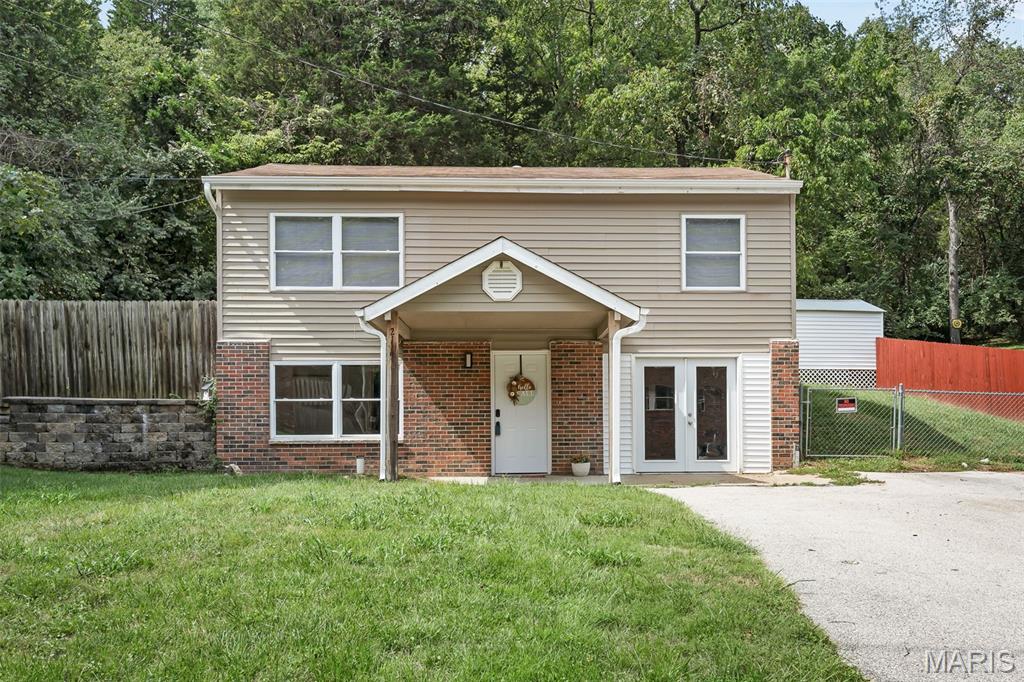 COMING SOON! 
PROFESSIONAL PHOTOS 9/13!

Charming, cute and full of potential! This 2+bedroom, 2-full-bath home has been thoughtfully updated while still retaining its original character. The original wood floors have beautiful potential and could be stunning refinished. Numerous major updates have already been completed, including a new furnace and A/C (2023), tankless water heater (2022), interior sewer replacement (2024), gutters and guards (2022), whole-house surge protector (2025), and extensive improvements to the basement and bathroom.

The lower level offers additional finished living space, a full bathroom (2025) and a flexible area that could provide additional sleeping space, home office, rec room or guest accommodations. The basement also has new flooring, tile, water lines, fixtures, vanity, shower and more. Outside, enjoy a fenced backyard backing to woods for a peaceful and private setting, along with an improved deck, shed (2025) and partial new fencing.

This home offers a wonderful opportunity for someone looking for charm, privacy and a long list of important updates, while still leaving room to add your own personal touches and make it truly yours!