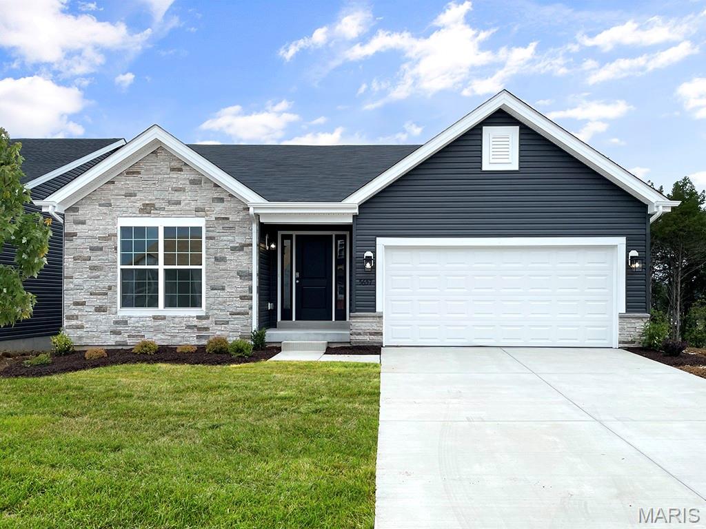 McBride Homes’ Aspen II 3BR, 2BA ranch-style home ready this summer! Enjoy an open floorplan with vaulted ceilings, 6ft windows, & beautiful wood laminate flooring in main living areas. The kitchen has a large island with a breakfast bar, Landen Flagstone 42” cabinets, quartz countertops, stainless steel GE appliances, & large walk-in pantry. The dining area has a sliding glass door that leads to a future covered patio area w/ a ceiling fan prewire. The primary suite has a large window, dual closets, & private primary bath w/double sinks & walk-in shower. Two extra bedrooms & full hall bath add convenience. Other extras include main floor laundry, ¾ bath rough in at LL, six panel white interior doors, ceiling fan prewires, plus garage coach lights. Louiselle Park is located just minutes from Creve Coeur Park with quick access to I-270 and Page Avenue. Enjoy peace of mind with McBride Homes’ 10yr builders’ warranty & incredible customer service! Similar photos shown.
