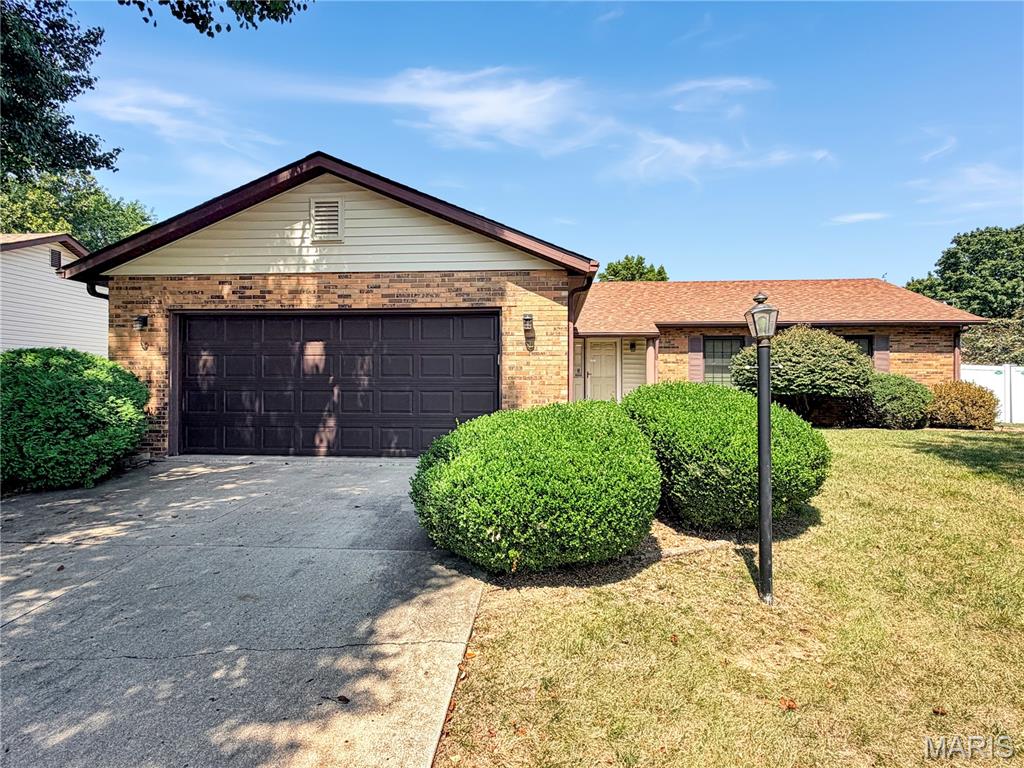 Welcome to 409 Kim Drive! Nestled in a well-established Fairview Heights neighborhood. This move-in-ready ranch home offers over 1,500 sq. ft. of comfortable main-level living. The expansive living room opens into the dining room, ideal for hosting guests. Gather in the cozy family room next to the stone fireplace, or gather through the sliding glass doors to the back patio to enjoy the private, vinyl-fenced yard. The eat-in kitchen comes complete with all appliances included, complemented by a dedicated laundry room equipped with built-in storage shelving. The primary suite features generous closet space and a private bathroom with a walk-in seated shower, while two additional bedrooms with large closets share a full hall bathroom with a tub. Located just minutes from premier dining, shopping, and major highway access. Jump on this one, you do not want to miss this well-maintained home in one of the most convenient locations to be in!