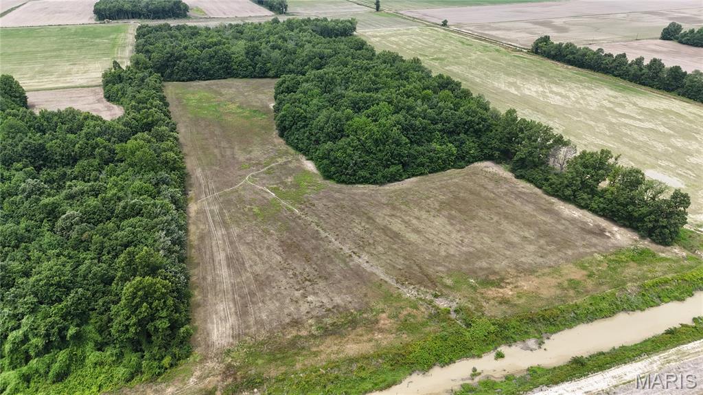 18(+/-) acres of prime farmable ground offering endless potential for crops, livestock, or future development. This productive acreage features open, usable land with plenty of room to expand your farming operation, build your dream home, or create the perfect country retreat. Conveniently located, this versatile property is a great opportunity for investors, farmers, or anyone looking to enjoy rural living with income-producing possibilities.