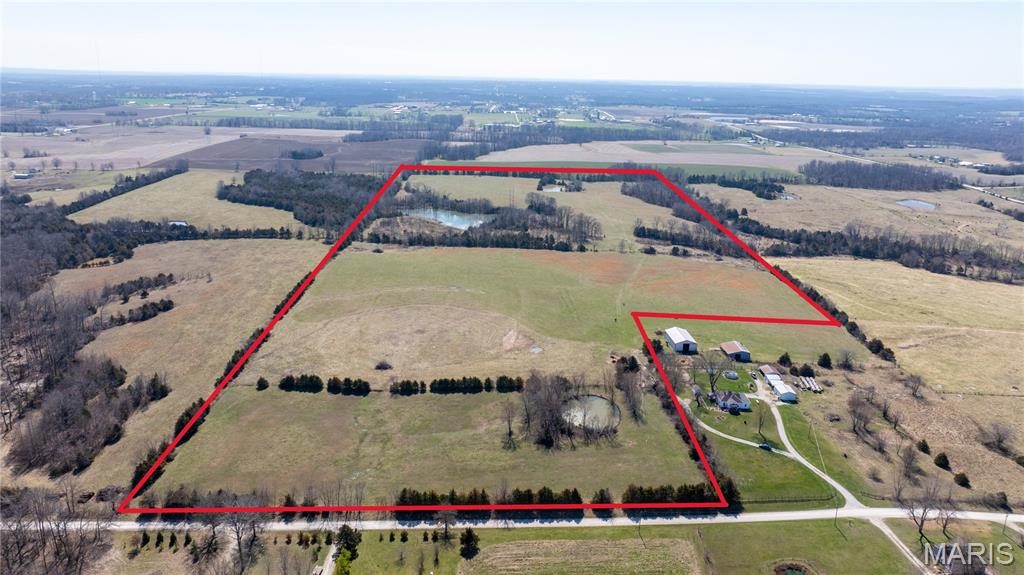 Opportunities like this are rare … a beautifully balanced +/- 69 acres tract offering the perfect combination of location, usability, and
long-term investment potential in the heart of Callaway County. This property features gently rolling terrain, multiple ponds/lake, and a
highly desirable mix of open pasture and timber, creating a setting that is both functional and visually stunning. Whether you're looking
to build, invest, or enjoy the outdoors, this property delivers. The land is well-suited for livestock, hay production, or continued
agricultural use, while the natural tree lines and water features provide excellent habitat for whitetail deer and turkey. The ponds not
only enhance the scenery but also offer fishing opportunities and reliable water sources. Location That Checks Every Box - Positioned in a
strong growth corridor, this property offers the perfect blend of rural privacy and accessibility: 10 minutes to New Bloomfield Schools, 15
minutes to Jefferson City, 20 minutes to Fulton, 20 minutes to Holts Summit (Moser’s grocery and Other local dining and shopping
centers), 30 minutes to Columbia, Quick access to Hwy 54 & Hwy 63 Endless Possibilities: Private estate or dream home build site;
Hunting & recreational retreat: Whitetail deer hunting, Turkey hunting, Fishing, ATV riding & trail development, Private weekend retreat
or cabin site; Livestock or hobby farm; Long-term land investment; Future residential development Investment Potential: With its
proximity to multiple major employment centers and ideal topography, this property stands out as a strong candidate for future
subdivision or multi-home development. The natural layout, road access, and scenic features create the kind of property buyers are
actively seeking in today’s market. Live the Lifestyle: Imagine evenings overlooking your own water, mornings watching wildlife, and the
flexibility to use your land exactly how you want…this is the kind of property that holds value both financially and personally.
SUBDIVISION CONCEPT with a Proposed Layout: 8–12 Rural Residential Lots; Lot sizes: 3 to 6 acres each; Designed to maximize: Pond
views, Privacy, Buildable topography Infrastructure Considerations: Electric nearby, Fiber Optic, County Water at the road, Minimal
grading needed due to gentle terrain. Buyer to verify all information. All Buyers must be pre-approved prior to viewing the property.
Survey to prevail boundary lines, Seller shall pay for survey, all offers should be based on price per surveyed acre.
