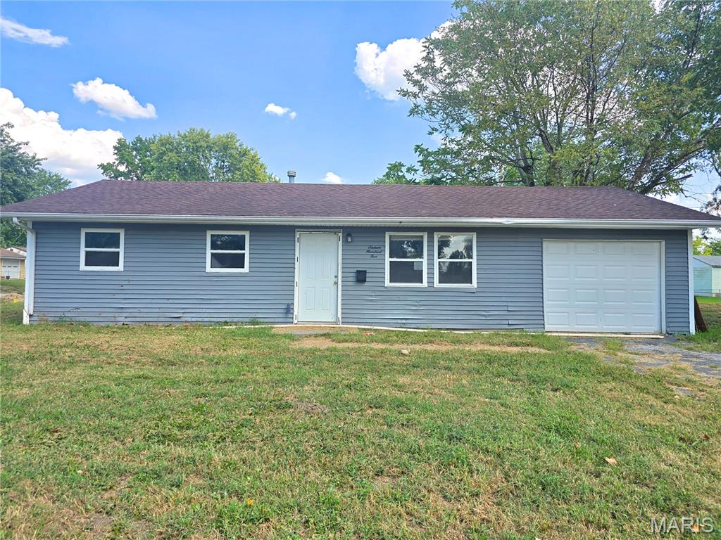 The Plywood covering the windows and doors is preventative. 
Looking for a place to make your own or your next rental unit? This three bedroom, one bath home in Cahokia sits on a fenced lot with a one car garage, offering privacy and room to spread out. The big ticket items are already handled here. The roof, furnace, and hot water heater all appear newer, so you can put your budget toward the finishing touches instead of the expensive stuff. For someone who wants sweat equity or a rental ready for the next tenant, that is a short list. This corner of Cahokia sees steady rental demand and homes here do not sit on the market long. Schedule your private showing today.