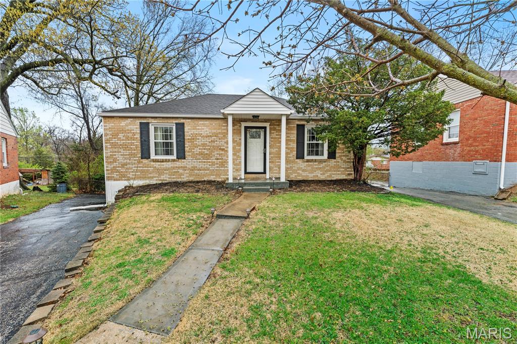 Charming and affordable 2 bedroom ranch nestled on a quiet cul-de-sac in South County! This well maintained home offers easy, one-level living with additional flexible space in the walkout lower level perfect for a guest room, home office, or hobby area. The bright kitchen features ample cabinet storage, functional counter space, and included appliances, making meal prep simple and efficient. Step outside to enjoy a spacious, fully fenced backyard with room to garden, entertain, or relax. Conveniently located with quick highway access while still offering a peaceful, low-traffic setting. Ideal for first-time homebuyers looking to build equity or those ready to downsize without sacrificing outdoor space or comfort!