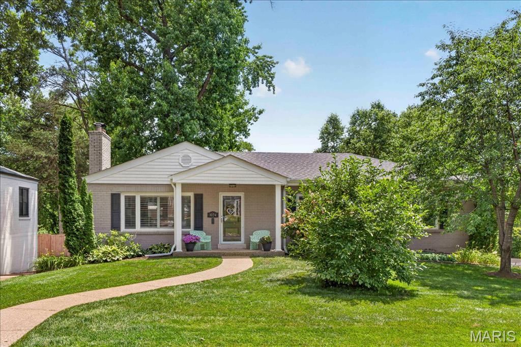 The curb appeal sets the tone for this beautifully renovated Clayton property!  Step inside to a terrific open floor plan with seamless flow, abundant natural light, and thoughtfully updated living spaces throughout. The home features a gorgeous kitchen, three generously sized bedrooms with custom closets, including a spacious primary suite with a private bath and double-sink vanity.  The finished lower level adds valuable living space and includes a another bath, dedicated laundry room, and direct access to the oversized two-car attached garage.  Enjoy your morning coffee or unwind in the evening on the back deck overlooking a generous green space, offering a peaceful setting for relaxation and entertaining.