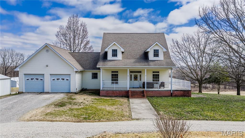 Built for expansion possible 4+ bedrooms & 4+ baths. This is a custom built 2,103 sq ft above ground, 1.5 story modern farmhouse sitting on a hill overlooking huge breathtaking pasture with woods sprinkled in on the north side that provides turkey & deer to watch on your screened in porch or lower patio. The property consists of 14.7 acres that have been immaculately maintained. The basement is large (1,463 sq ft) enough to entertain that walks out to awesome views. The home has a huge attached 25x33 garage. Insulated 24x40 shop building with electric, large side shed for storing tractors, boats off of the main shop building. The open shed furthest from the house could hold larger equipment or horses/cattle. This property shows much better than we can possible write about. With the extremely nice home, sheds/shop, lay of the land you can embrace the tranquility of country living at its finest. Asking $589,900. Recently appraised for $675,000. Lp tank is owned & gas purchased gas from Halter. Usually 1 1/2-2 tanks year. Depends upon what you buy per gallon.  Semo fiber $85-115 depending what you want. $127.80 is electric average month, Black River electric.
