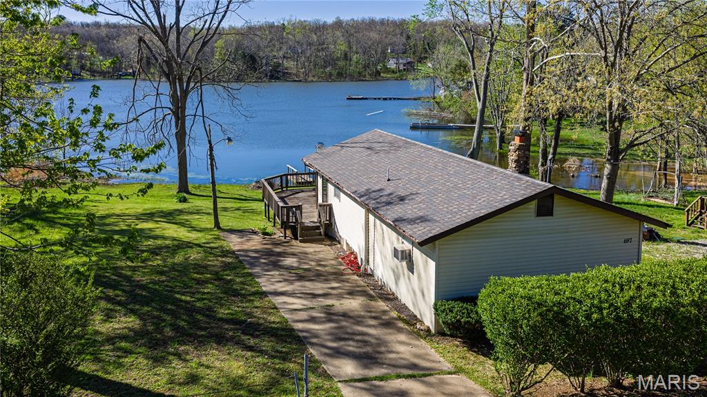 Escape to peaceful lakefront living with this charming 2-bedroom, 1-bath cabin nestled on a private lake. Perfect as a weekend getaway or full-time retreat, this cozy property offers direct lake frontage, your own private dock, and a spacious deck overlooking the water—ideal for entertaining, relaxing, or simply taking in the stunning views.
Inside, the cabin features a warm and inviting layout with comfortable living spaces. The newly updated open living area creates a relaxed atmosphere for gathering with family and friends. A 10' x 14' storage shed provides ample space for tools, lake gear, and outdoor equipment.
Surrounded by nature yet offering all the essentials for comfortable living, this lakefront
cabin is a rare opportunity to own your own slice of paradise. Don’t miss your chance to experience quiet, waterfront living at its best.