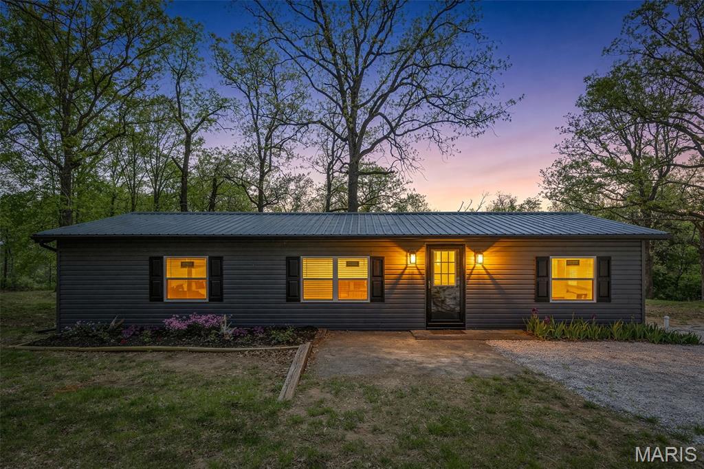 Spacious 3-bedroom, 2-bathroom rehabbed home situated on 2 private acres, offering the convenience of single-level living. This move-in-ready property features updated flooring, modern lighting, and a refreshed kitchen and bathrooms. The kitchen is equipped with sleek stainless steel appliances, perfect for everyday living and entertaining.
The home includes a comfortable primary master suite complete with its own private bathroom, providing a relaxing retreat at the end of the day. Enjoy over 1,300 square feet of space, along with an expansive backyard ideal for outdoor activities, gatherings, or simply relaxing in your own private retreat. A storage shed adds extra functionality and convenience. The property also boasts a large driveway with plenty of parking, plus ample room to add an additional outbuilding or garage—perfect for future expansion, hobbies, or extra storage. This property combines modern updates with space, flexibility, and privacy—don’t miss this opportunity to make it yours.