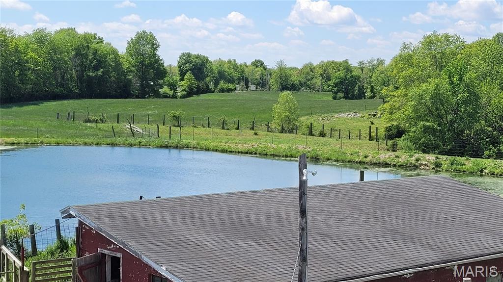 Cattle farm with 68 acres of wonderful pastures for any animals you wish to have.  There are several creeks on the property that have never ran dry.  Multiple builds that have been used for Cattle, horses, sheep, goats and chickens.  Big red barn was built with solid oak and has plenty of room.  Smaller barn near the house was built with solid oak as well and has a tackle room for horses.  The back of the property backs up to Hillsboro lake.  There is a beautiful pond by the house that is fully stocked and ready to be fished.  The house has 4 to 5 bedrooms with 2 on the main level and 3 upstairs.  Eat in kitchen and a formal dining room for extra room for any gatherings.  There are 2 large living rooms that are perfect for any gatherings you may have.  Property is just waiting for the new owners.