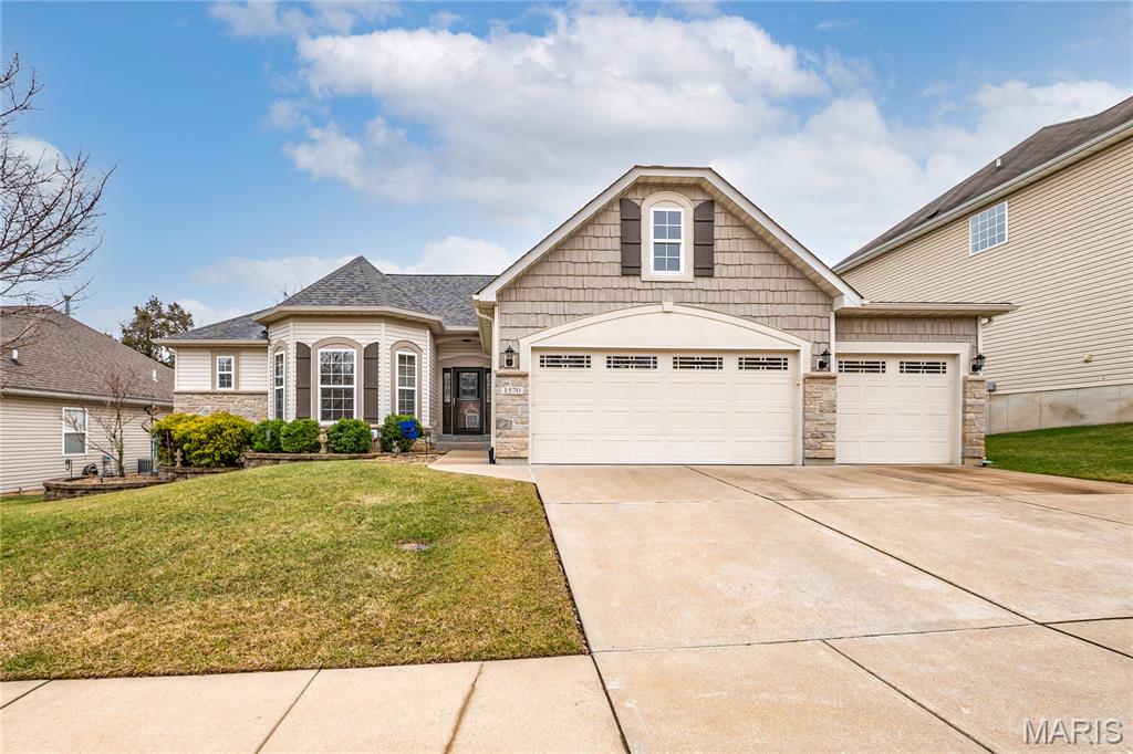 Beautiful updated ranch home with 4 bedrooms, 3 baths, main floor laundry, truly oversized 3 car garage, finished walk out lower level providing 3,358+ square feet of living area. Enter from the covered porch into 8x6 foyer that opens to the dining room to the left and flows to open concept Great Room, kitchen, breakfast area. Check out the dining room coffered ceiling and stunning light. The gorgeous kitchen was updated in 2021 with all new solid cabinetry with lots of drawer stacks, granite counters that extend as back splash, and a revised island that offers so much counter space that is fantastic when entertaining. Nice walk in pantry is 4x4. All three baths were refreshed as well in 2021. Great room is a spacious 23x19 with vaulted ceilings and gas fireplace. From the breakfast room sliding door you can access the 24x12 low maintenance deck that overlooks the fenced rear yard. You can see the lake down below during the winter months. Primary suite has tray ceiling, 4 bay window, refreshed bath including heated floors, private water closet, and a huge walk in closet. The other two main level bedrooms are 12x12 and offer double door closets. Laundry room is separate with new floor and cabinetry added. Lower level has a super size recreation room including a wet bar, speakers in the ceiling, lots of can lights and the 4th bedroom and full bath. That's not all as there is a 12x12 custom exercise room through the double doors. Don't worry as there is still a whole lot of unfinished area for storage or whatever you please. Out back there is a 42x13 patio and level yard area plus the yard goes beyond the fence at the rear. Inground sprinkler system helps to keep the grounds looking good. New roof, gutters, and downspouts in October 2024. Come see starting Friday March 6th.