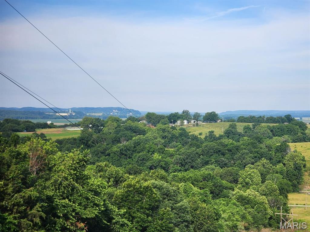 Scenic 6.52 acres +/-  just north of Hermann in Warren County off Hwy 94.   This is gorgeous land with spectacular views- this one of a kind acreage located on a hilltop with many areas to build your dream.  No Restrictions.  Your dreams, your vision, your land-- Its time for your ideas to come to life.   Seller may consider a Shared Well Option.  More acreage is available.  Must see property.