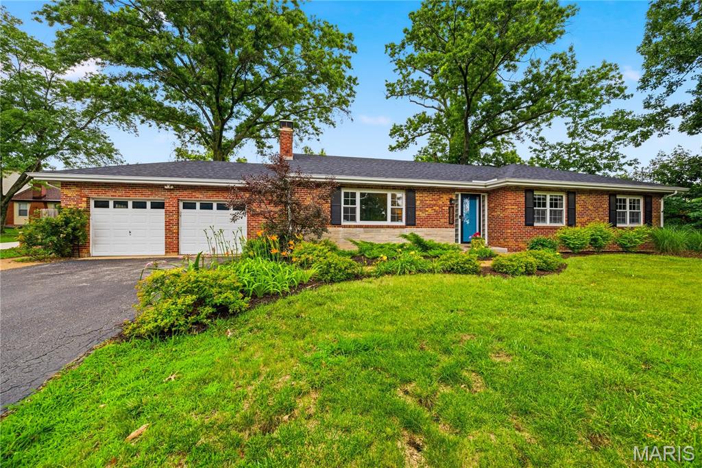 **Beautifully Updated Home in the Highly Sought-After Lindbergh School District!**

Welcome home to this beautifully maintained property situated on nearly a half-acre lot in the heart of St. Louis County. The attractively landscaped front yard creates exceptional curb appeal, while gorgeous hardwood flooring flows throughout the main level, creating a warm and inviting atmosphere

The spacious living room features a cozy wood-burning fireplace and seamlessly opens to the dining room, which offers direct access to the covered patio and large, level, fenced backyard—perfect for entertaining, relaxing, or play.

The bright, updated kitchen is a standout, featuring custom white cabinetry, stunning granite countertops, a large pantry, breakfast bar, stainless steel appliances, and newer lighting. Refrigerator stays.

Retreat to the spacious primary suite, complete with a walk-in closet and a beautifully renovated ensuite bath featuring a custom double vanity, separate shower, whirlpool tub, and exceptional tilework throughout. Two additional generously sized bedrooms and an updated hall bath with custom vanity complete the main level.

Convenience abounds with main-floor laundry. The partially finished lower level offers a spacious family/rec room with newer carpeting and includes a bathroom rough-in, providing excellent potential for future expansion.

Ideally located just minutes from shopping, dining, parks, and major highways, this move-in-ready home combines comfort, style, and an unbeatable location.

**Highlights:**

* Lindbergh School District
* Nearly half-acre level lot
* Hardwood floors throughout main level
* Wood-burning fireplace
* Updated kitchen with granite & stainless appliances
* Spacious primary suite with luxury bath
* Main-floor laundry
* Finished lower-level family/rec room
* Bathroom rough-in in basement
* Covered patio & fenced backyard
* Convenient central St. Louis County location

This one is a must-see!