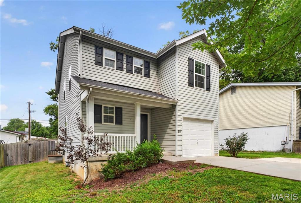 Fabulous 9 year old 2 story home in Ballwin, 3 bedrooms, 2.5 baths. Newer home in the area,  large fenced backyard, Kitchen, breakfast area, family room, & powder room on main level. Sliding door to large flat fenced backyard. 1 car attached garage, driveway with extra parking pad.  Upper level has 3 bedrooms and 2 full baths, plus 2nd floor laundry! New carpet in family room and 2 bedrooms 2026.  Clean and spacious unfinished basement for storage or waiting to be finished. Convenient location close to hwys, shopping, schools and Reber park right across the street! Well maintained home under 10 years old, hard to come by in this area. Parkway School District.