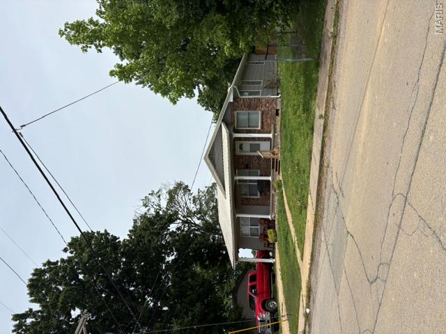 Mechanics dream with this 28' x 30' Metal Building with its own electric, heating and cooling with loft storage area. Also an extra small garage is attached. Home offers open floor plan and living room has a hidden safe build into the wall. Main floor laundry area. Deck could use some TLC. Pretty of off street parking. This property is part of a trust for Todd W. Bond.