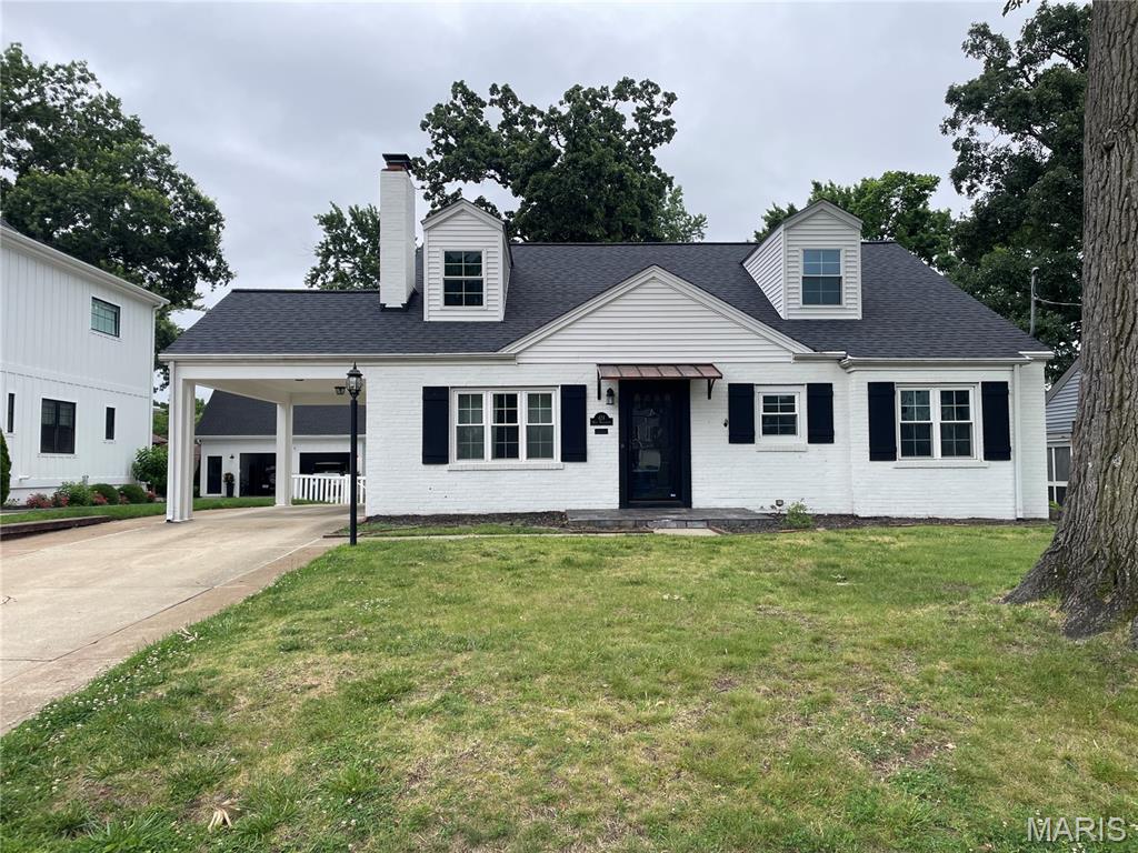 This 4 bed/3 bath Kirkwood charmer has a lot to offer! The light-filled living room offers a gas fireplace flanked by built-ins. The informal dining area and updated kitchen with custom maple cabinetry with modern pulls, breakfast bar and SS appliances opens into the large family room. The large, covered back porch and cedar deck overlook the large fenced-in backyard with oversized 2 car garage and mature stately trees with established landscaping. Main floor master with huge walk-in closet and en suite bath with jetted tub and separate shower. Another bedroom and updated bath complete the 1st floor. 2 nice-sized bedrooms and another updated bath make up the 2nd floor. The LL offers even more room with 3 different spaces - rec room, home gym, playroom...you decide! Walkable to downtown Kirkwood with great shopping and dining - don't miss out...it won't last long!