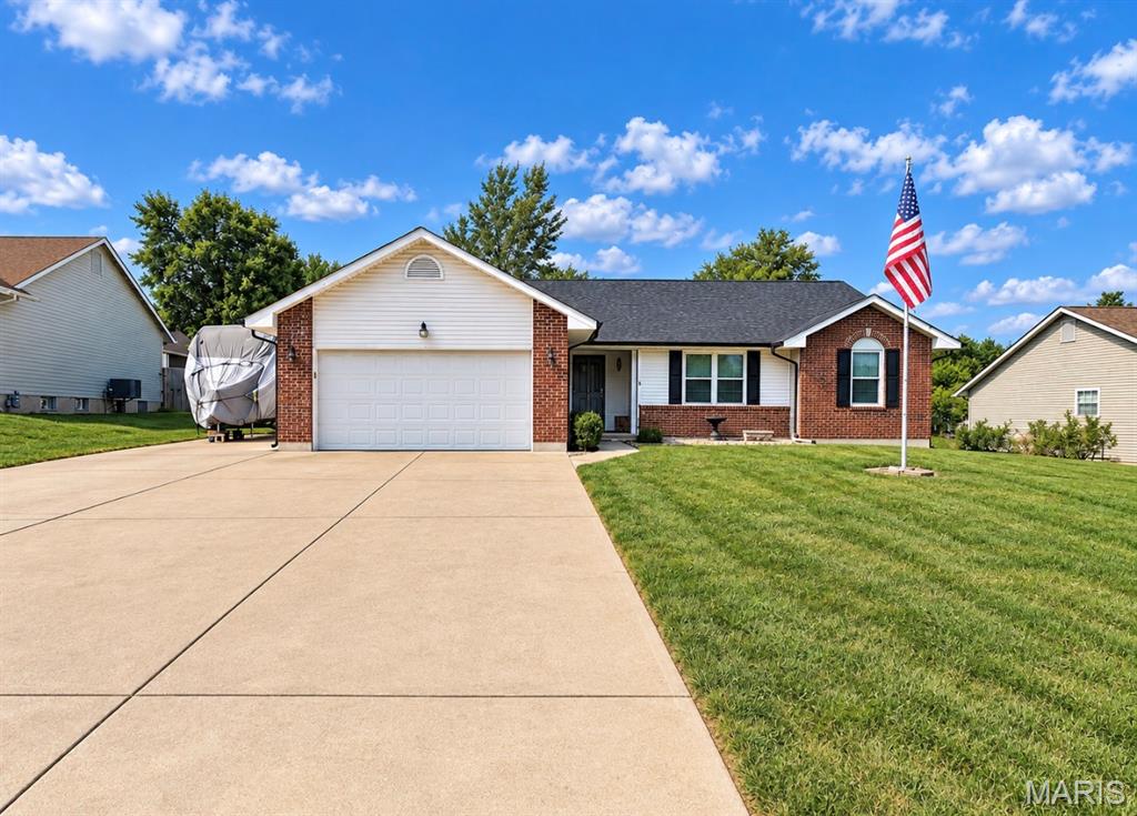 Welcome home to this spacious 3-bedroom, 2-bath home offering an open floor plan and plenty of room inside and out! The main level features a welcoming living area that flows into the kitchen with a center island, plus convenient main-floor laundry. The 2-car garage and extended driveway provide plenty of parking, including space for a camper, RV, trailer, or additional vehicles.

Outside, the fully fenced backyard features low-maintenance vinyl fencing and a large patio perfect for entertaining. Need extra workspace or storage? The 23x19outbuilding is ready to go with two roll-up doors, 220V electric, and a wood-burning stove.

The partially finished basement adds even more usable space with a huge rec room, an office or potential additional sleeping area, a full bathroom, and plenty of unfinished space for storage. With flexible living space, great outdoor features, and a shop that’s hard to find, this home has a lot to offer