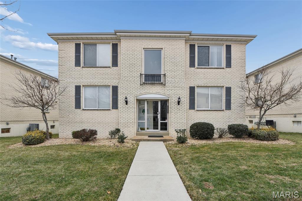 Step into this sought after main floor unit condo designed for easy living. This freshly painted home features a bright, open floor plan and two generously sized bedrooms. The 17X12 primary suite has double closets as does the second bedroom. The kitchen features a side by side white GE profile refrigerator, electric range, tile backsplash, dishwasher, and laminate countertop.  The bathrooms feature white tile flooring and tub/shower surrounds.  They have updated vanities. There is a lower level bonus room: A massive (16 X 14) private storage space—perfect for a home office, gym, or workshop and it has laundry hookups.  There is also an in-unit laundry room that is large enough for full-sized appliances.  It has vinyl insulated double pane thermal windows throughout. There are also ceiling fans. The private garage includes a designated space with an automatic opener. It is located minutes from hospital, shopping, dining, and transit.  It is in award winning Lindbergh School District. This home offers a low-maintenance lifestyle with reasonable fees that cover almost everything (water, sewer, trash, snow removal, and landscaping).