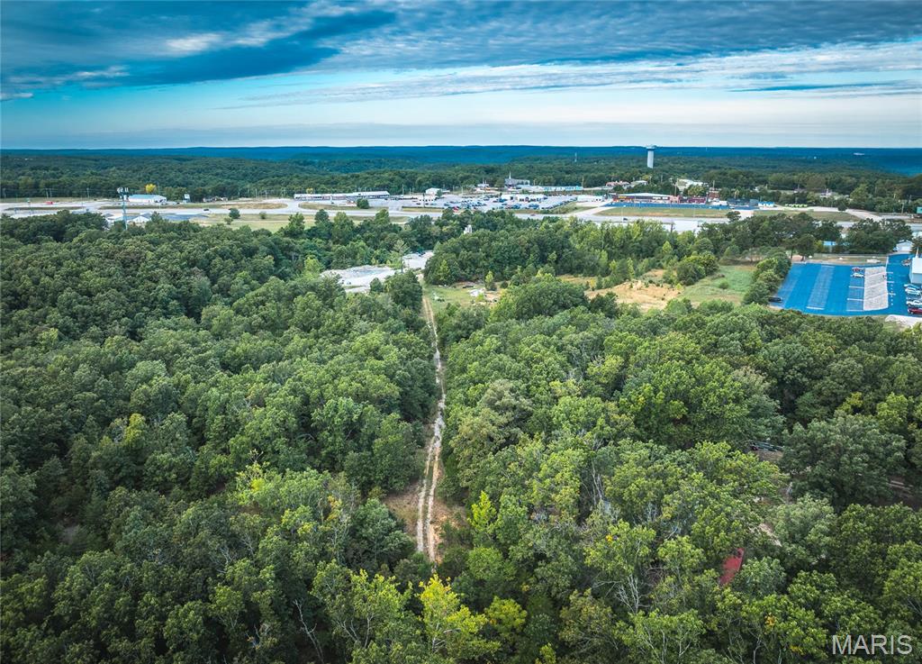 Incredible opportunity with 40 acres of prime real estate land located just outside the gates of Fort Leonard Wood. With convenient access from Missouri Avenue, this property offers endless possibilities for development and growth within the community. Whether you’re envisioning residential housing, commercial projects, or mixed-use potential, this parcel provides the space and location to bring your plans to life. Utilities are nearby, making the development process even more accessible. Don’t miss this chance to invest in a rapidly growing area with outstanding potential.