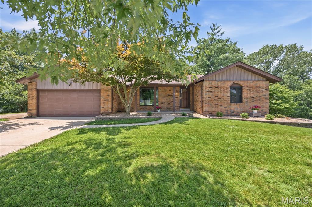 Tucked away on a quiet cul-de-sac and backing directly to the breathtaking beauty of Cliff Cave Park, this is more than a home—it's a lifestyle. Imagine stepping from your newly renovated deck onto miles of wooded trails, with over 525 acres of preserved forest, wildlife, and scenic hiking and biking paths quite literally at your back door. Whether you're an early morning trail runner, an avid mountain biker, or someone who simply loves sipping coffee while surrounded by nature, this home offers an everyday escape without ever leaving your neighborhood.

Inside, warmth and timeless craftsmanship greet you at every turn. Rich, beautifully preserved woodwork, soaring vaulted ceilings with striking exposed beams, and custom built-ins flanking the fireplace create a great room that feels both grand and welcoming—the kind of space where holidays are celebrated, conversations linger long after dinner, and memories are made.

The walk-out lower level is an entertainer's dream, blending nostalgia and functionality with its incredible 70s-inspired bar, expansive gathering spaces, fourth bedroom, third full bath, generous storage, and room to host everyone for game days, movie nights, holidays, and celebrations.

And when you step outside your front door, the lifestyle only gets better. This vibrant neighborhood is known for bringing neighbors together with community parades, seasonal events, and amenities that make every day feel a little like vacation—including a neighborhood pool, tennis courts, basketball court, sand volleyball court, playground, and swings. Whether the kids are riding bikes to the pool, friends are gathering for a summer volleyball game, or you're ending the evening with a walk through the trails, life here is centered around community, connection, and the outdoors.

Homes offer bedrooms and bathrooms. This one offers a way of life—where nature is your backyard, adventure begins at your deck, and the best memories are waiting to be made.

New windows in bedrooms and basement 2024, New electrical service 2024, New flooring throughout 2024, Deck resurface and handrails 2024, New roof 2025, New refrigerators 2026