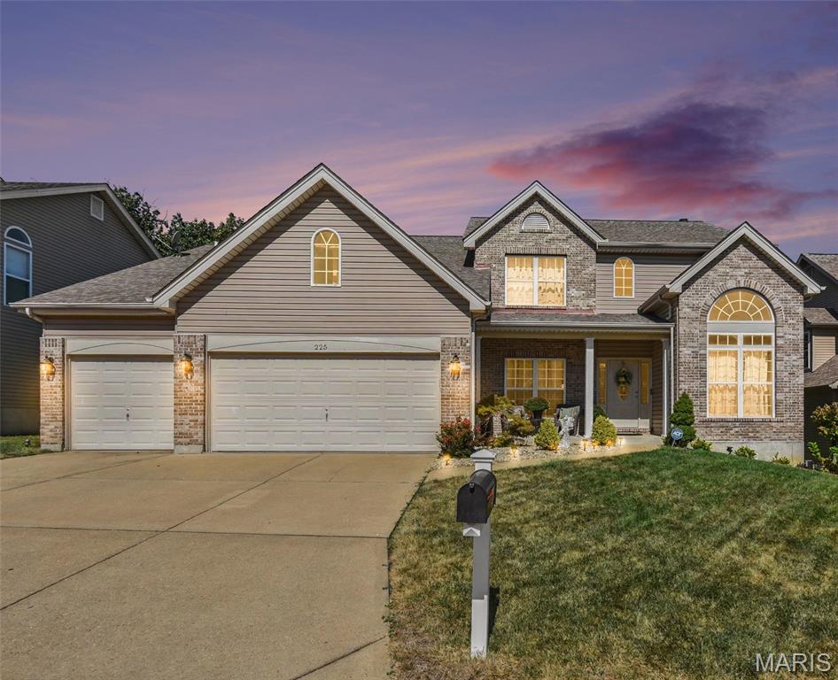 Welcome home to this stunning 1.5-story home filled with natural light from a striking wall of windows! Designed with an open, flowing floor plan, 9 ft main-level ceilings, some arch openings and 4 bedrooms with 4 bathrooms. The chef-inspired kitchen boasts 42" maple cabinets, a large island bar, crown molding, tile backsplash, SS appliances and ceramic tile flooring, opening seamlessly to a large breakfast room with a bay window. Host dinner parties in the formal dining room complete with wainscoting and crown molding, or work in peace in the private main-level den featuring an elegant Palladian window. A soaring two-story great room centers around a cozy brick wood-burning fireplace. Retreat to the main-floor primary suite, featuring vaulted ceilings, a bay window, ceiling fan, and a luxurious ensuite bath with tile floors, maple vanities with a makeup station, a deep soaking tub, separate updated shower, and a spacious walk-in closet. Upstairs, you’ll find three generous bedrooms, each equipped with ceiling fans and walk-in closets. The partially finished walk-out basement adds flexible living space complete with drywall, electric, and a convenient half bath. Step outside to the large deck or lower level patio overlooking a private partially fenced backyard—perfect for outdoor entertaining! Includes an oversized 3-car garage and main-level laundry.
