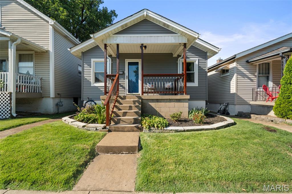 Storybook charm meets move-in-ready convenience at 5424 Blow! Tucked into the heart of Princeton Heights, this delightful home has all the personality you hope to find in a classic St. Louis property, paired with the modern updates you’ll be thrilled to already have completed.
From the inviting covered front porch to the beautifully refinished original hardwood floors, this home feels warm and welcoming from the moment you step inside. Upgraded recessed lighting throughout adds a fresh, bright feel while allowing the home’s original character to shine. The comfortable living spaces flow easily into a cheerful kitchen and dining area, creating a home that feels both cozy and functional.
And the updates don’t stop inside! A brand-new roof and new siding give you major exterior improvements already checked off the list. There’s also a functional one-car garage—a fantastic bonus for city living—plus a partially finished lower level offering extra space for a home office, workout area, hobby room, game room, or whatever fits your lifestyle. Best of all, this home is truly move-in ready and has already passed the city inspection, so you can spend less time worrying about projects and more time making it your own. If you’ve been looking for a home with the storybook charm of yesterday and the practical updates you want today, 5424 Blow might just be the happy ending you’ve been waiting for.