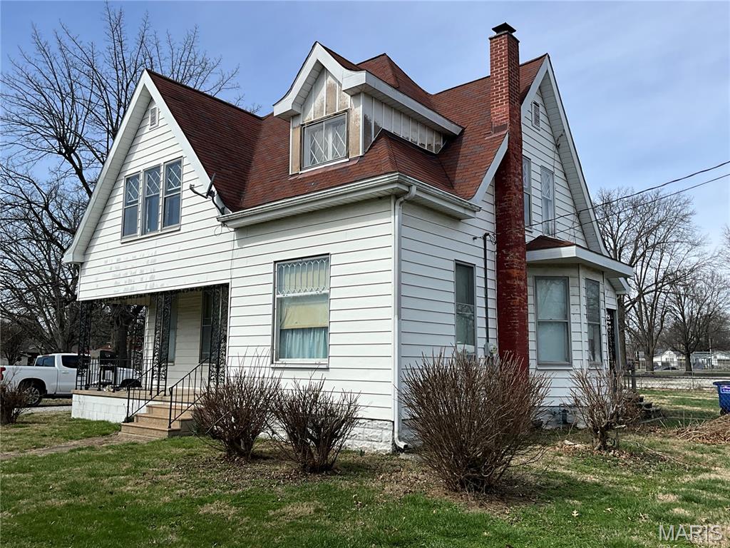 Full of character and charm, this 1.5-story home sits proudly on a large corner lot made up of three parcels and offers a unique style that stands out from the moment you arrive. The exterior has great curb appeal, while inside you’ll find beautiful original woodwork and a stunning wooden staircase leading to the second level, much of it still in its natural, unpainted condition.

The main level features a spacious living room, galley-style kitchen, cozy breakfast nook, and a formal dining room, along with a full bath. Upstairs you’ll find three bedrooms, offering comfortable space while continuing the charm and character found throughout the home.

The home also includes a full basement with updated wiring, providing excellent storage and utility space.

Step outside to the covered front porch, the perfect place to relax and take in the community. From here you can enjoy Staunton’s parades, balloon glow, and homecoming festivities right from your own front row seat. The property also includes a two-car detached garage, an additional storage building, and a chain-link fenced backyard ideal for pets.

Location is a major bonus with Staunton’s ballparks, playground, swing sets, skate park, and recreational areas just steps away, giving you the feel of having all the neighborhood fun right in your own backyard.

With three lots, a corner location, and timeless character throughout, this property offers space, charm, and a fantastic setting in one of Staunton’s most enjoyable areas.

Gas stove is non functioning.