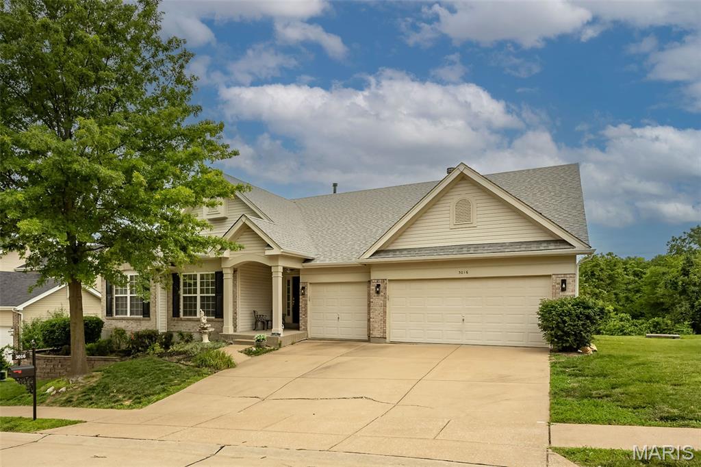 Welcome to 3016 Kingsridge Manor—where comfort, style, and everyday functionality come together in this beautifully maintained atrium ranch. From the moment you step inside, you’ll appreciate the inviting split-bedroom floor plan, rich hardwood flooring, and abundant natural light throughout.
The updated kitchen is a true centerpiece, featuring granite countertops, 42" cabinetry, and stainless-steel appliances—perfect for both daily living and entertaining. Just beyond, step out to the newer composite deck or down to the stamped concrete patio, all overlooking a peaceful backdrop of mature trees.
The spacious primary suite offers a relaxing retreat with a charming bay window, dual vanities, and a separate tub and shower. Two additional bedrooms are privately situated with an updated full bath, plus a versatile bonus room ideal for a media space, study area, or home office.
The finished lower level expands your living space with a large rec room, walk-behind wet bar, fourth bedroom with an oversized walk-in closet, and a full bath—perfect for guests or multi-generational living. Ample unfinished storage space ensures everything has its place.
Recent updates include a new roof and skylights (2025), select windows and siding (2026), retaining wall, and composite deck. A 3-car garage adds convenience, while the location can’t be beat—just a short walk to Bee Tree Park and within sought-after Mehlville R-IX School District.
This is a home that truly checks every box—don’t miss your opportunity to make it yours.