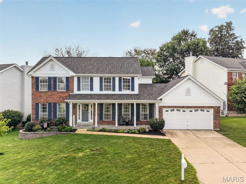 Rare waterfront in Wellington Farm. Tucked on a quiet cul-de-sac and backing to the neighborhood pond, this updated 4-bedroom, 2.5-bath brick two-story offers the one thing you can't renovate in — a private water view. Inside, a spacious primary suite anchors the upper level with a huge walk-in closet, while the main floor flows to a resort-style backyard built for entertaining: stamped-concrete patio, hot tub, hardscaped garden beds, and a deck overlooking the water. The big investments are already made — new roof, gutters, and premium insulated siding (~$60K in updates). A large unfinished basement adds room to grow. Zoned for the award-winning Francis Howell R-III schools, with an unincorporated address (no city tax) just minutes from Old Town Cottleville, dining, trails, and Highways K, 94 & 364. Homes on the water here almost never come up — don't wait on this one.