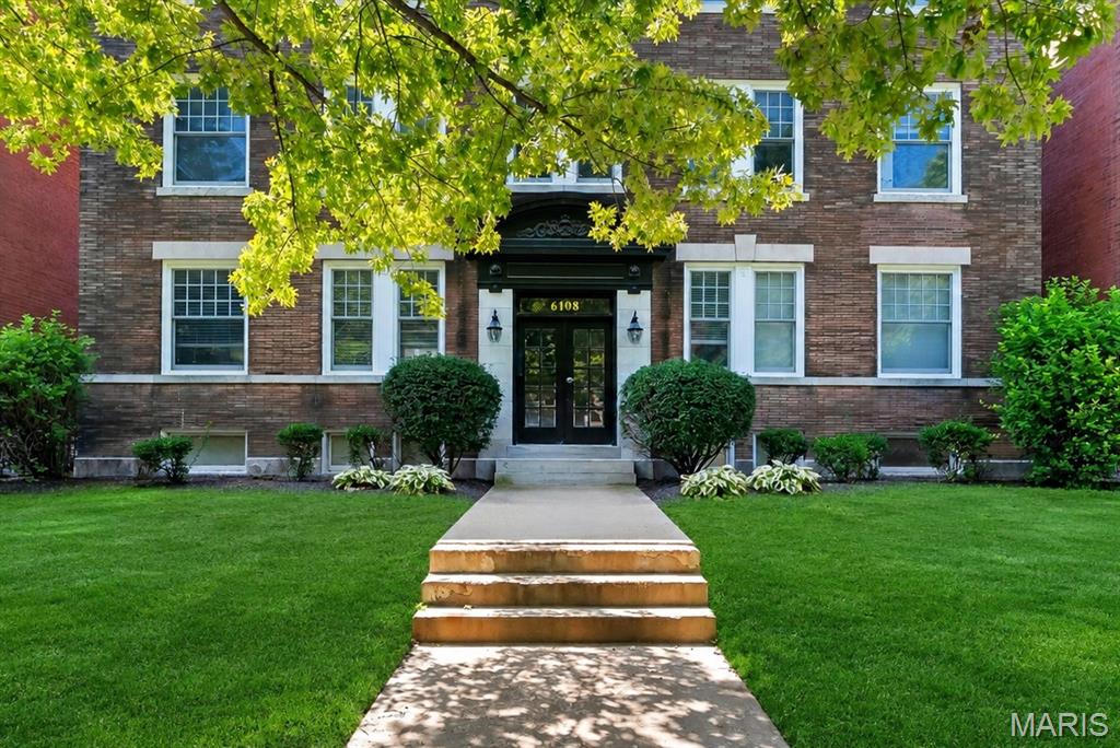 Discover city living at its best in the Historic Skinker-DeBaliviere Neighborhood, offering a relaxed urban lifestyle within walking distance of many of the area's amenities.  Enjoy the nearby Loop with a variety of shops and restaurants, including Blueberry Hill, as well as entertainment venues such as the Pageant and Pin Up Bowl. Other attractions include the Delmar Maker District, Forest Park, Wash U, and the Metrolink, just to name a few!  Located on a pretty tree-lined street off the beaten path in a secluded residential area, this beautifully renovated 2nd-floor condo boasts just under 1,600 sq ft., offering the entire 2nd floor of the building all to yourself! Enter to find a fabulous open-concept interior that blends historic architectural details with modern comforts, featuring high ceilings, recessed lighting, and an abundance of large windows that fill the space with natural light.  Beautiful wood floors, neutral tones, and white woodwork create an inviting atmosphere. The spacious living room, dining area, and kitchen flow seamlessly together, making it perfect for entertaining. The well-appointed kitchen features custom cabinetry, granite counters, stainless appliances, and a generous island with seating adjoining the dining room.  A versatile bonus room off the living room can be used for a variety of purposes, such as a home office, den, media room, or exercise space... You decide!  Spacious primary bedroom with a private ensuite that includes a separate shower and soaking tub, adorned with beautiful travertine stone tile, plus a large walk-in closet.  The second bedroom is also generously sized and is conveniently located near the hall bath, which also showcases travertine tile.  The convenient laundry room includes storage space.  For outdoor enjoyment, step out to a large covered deck, perfect for gathering with friends or enjoying a peaceful moment to yourself.  A large storage locker is located in the basement.  Gated parking with 2 assigned parking spaces.  Updates include: New carpet in Primary and 2nd bedrooms Spring 2026, Roof replaced 2026 (HOA responsibility - 7 roofs were replaced; all have been replaced within the last 3 years), Interior painting in 2024, ceiling fans 2023, recessed lighting with adjustable LEDs 2023, AC replaced 2023.