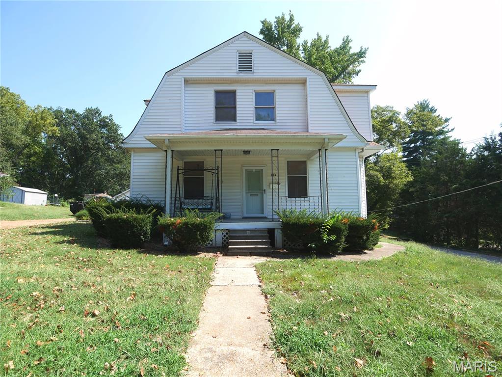 Opportunity here to get a spacious home for $150k! This 1905 2 Story home needs updating and some repairs but is priced below market for homes of this size in the area. Much of the work is cosmetic; painting, flooring and cleaning. Update to your liking and you will have a large home with a comfortable payment. This 1752sf home has vinyl siding, 4 bedrooms, 2 bathrooms and a detached 2 car garage. Home has thermal tilt-clean windows. It sets on a .38-acre lot. There is an additional to the original home used as a large family room on the main level. Laundry is located on the upper level in the hall bathroom; the washer and dryer are included. Full bath on main level off the family room. There is a patio at the rear of the home and a 2nd patio on left side at the entrance to the family room. The plumbing stacks are PVC. The dining room is currently used as owner's bedroom due to inability to go up the steps to the bedrooms. The living room adjoins the dining rm; you must go through dining room to get to the living room - this is due to remodeling of the kitchen. The long driveway can provide extra off-street parking. Property is sold in its as-is condition; seller will not make any repairs nor pay for inspections. The Ferguson exterior occupancy inspection has not been done. Home is occupied and the contents will be removed by closing day.