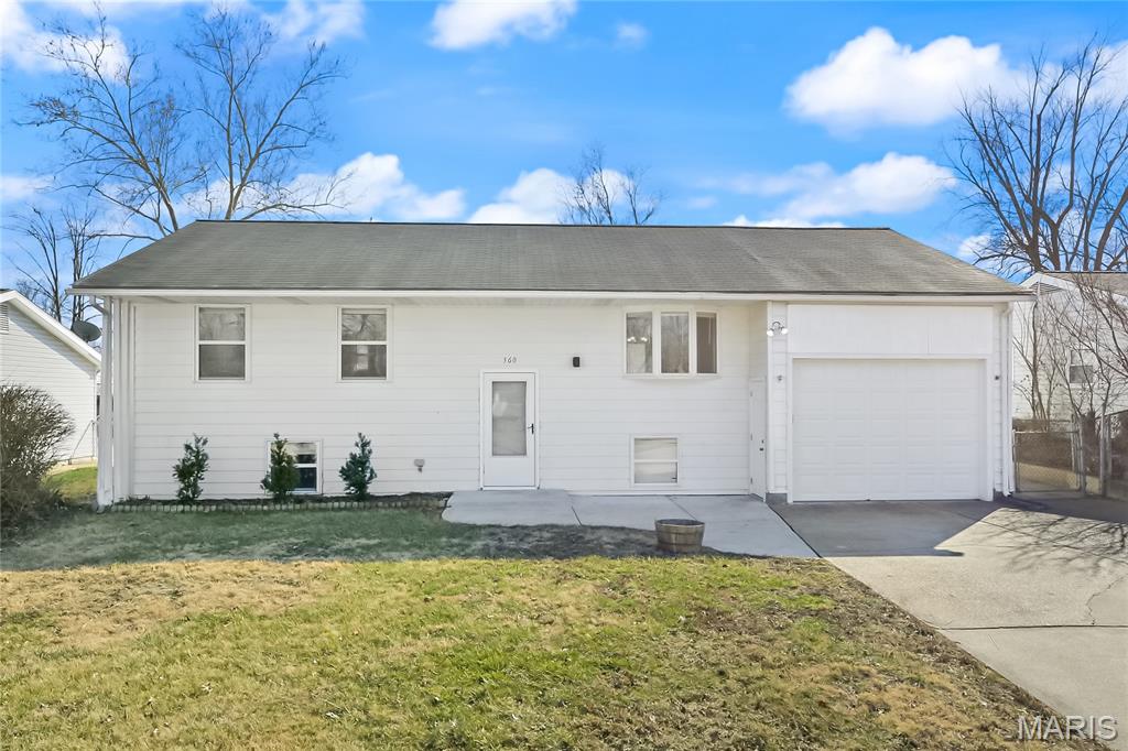 Welcome home to this move-in ready, 4-bedroom, 2-bath split foyer in the highly sought-after Lindbergh School District! This home offers the ultimate in location -just minutes from parks, soccer fields, golf, dining, nature preserve, river walk, bike trail and major highway access. Wow! Step inside to a fresh, clean atmosphere featuring newly painted walls and ceilings. The interior boasts a modern aesthetic with beautiful refinished hardwood floors, ceramic tile, and brand-new carpet. On the main level you will enjoy the light-filled living area which flows into a functional kitchen with good cabinet storage and a spacious dining room area, making it an ideal space for entertaining. Directly off the kitchen you will exit to the spacious fenced backyard with a huge covered patio area perfect for sitting area and summer bbq's. Two comfortable bedrooms and a full bath—complete with a new skylight and jetted tub round out the main floor. Next you will love the finished walkout lower level which offers incredible versatility. Whether you need a family room, home office or workout space, this level fits your lifestyle. It features a full bath as well as the third and fourth spacious bedrooms, along with a large utility room for HVAC, extra storage and your laundry room. The "must-see" feature of this home is the huge, attached tandem garage. With room for 2–3 cars, it offers endless possibilities for a workshop, toy storage, or extra equipment. With thoughtful updates completed, this home is ready for its next owner to move in, relax and add their personal touch. Don't miss your opportunity to own in this prime location at an incredible price point -schedule your showing today!
