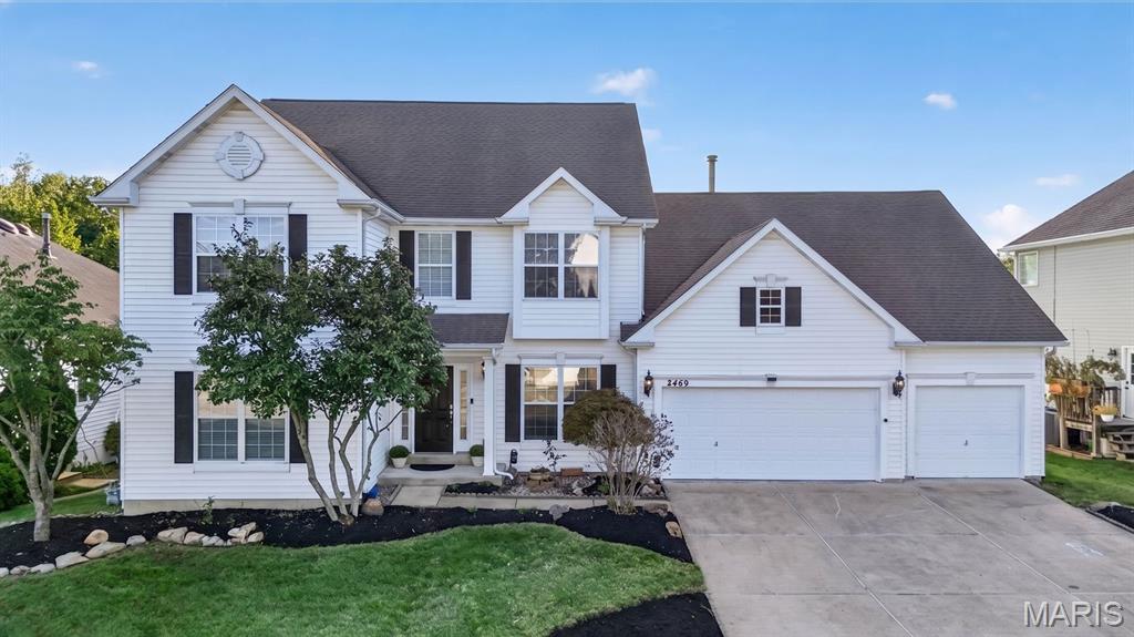 From the moment you enter, the scale, natural light, and thoughtful design of this 1.5-story home are immediately apparent. The dramatic two-story great room is the centerpiece, with a wall of windows drawing natural light deep into the space and offering a wonderful connection to the private backyard. A handsome fireplace adds warmth and creates an inviting backdrop for evenings at home or gatherings with family and friends. The kitchen opens naturally to the main living areas and features a new ZLINE 8-burner range, making entertaining easy and keeping the flow of the home relaxed and connected. Upstairs, three generously sized bedrooms each offer exceptionally large walk-in closets, providing comfort and practical storage. The outdoor setting is equally appealing, with a private yard that backs to common ground, creating a peaceful sense of space and privacy. With more than 3,500 square feet, the home offers generous room to live, gather, and retreat, while its open design and thoughtful proportions give it an easy, welcoming character. It is a home that feels both gracious and genuinely livable.
