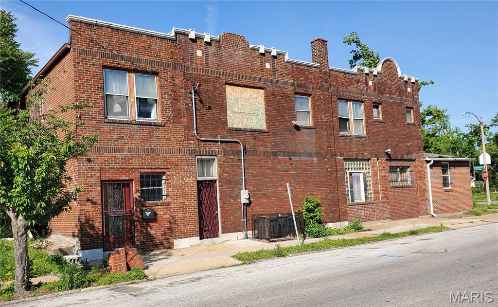 Back on Market - No Fault of Seller - Owner will consider financing -  Expansive 4,071 sq. ft. commercial building, formerly used as a church, offers endless possibilities for its next chapter. Situated in the O’Fallon neighborhood, the property is well-suited for continued use as a place of worship or can be reimagined as office space, a residential conversion, community center, event venue, and more. The main level features a welcoming sanctuary and separate men’s and women’s restrooms. Upstairs, you’ll find multiple spacious rooms that can accommodate both small meetings and large gatherings, along with a full bathroom. The basement adds space for an abundance of storage. The newly installed roof add value and allows the new owner the ability to develop the site quickly into its desired use. Schedule a tour today!