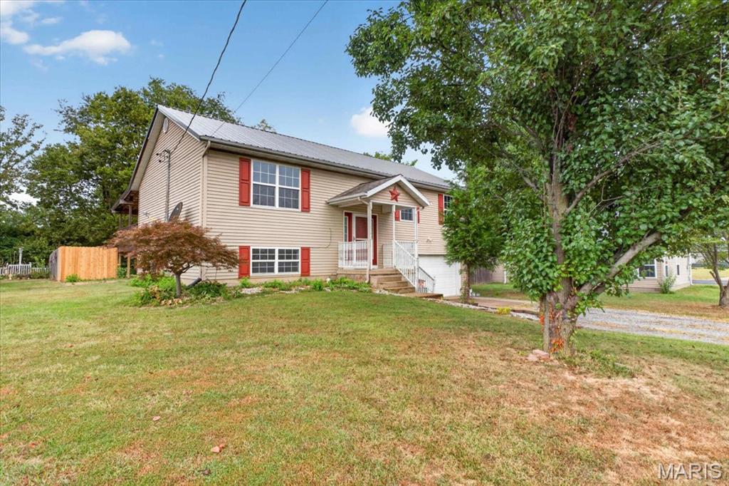 This  4 Bedroom, 3 Bath home is located in a Great Subdivision, Features: Updated Kitchen with custom soft close cabinets, Granite Counter tops, fabulous Island with high top counter for eating and a copper farm sink: New Stainless appliances (2024), New HVAC 2025, NEW METAL roof 2026 and a NEW 45' x 16' covered deck overlooking fenced back yard.  Part of the deck covers the 24' x 16' patio and there is a large area for storage under the deck also.  The back of the house has new Hardiboard and there is enough left to side the rest of the house.  The seller was transferred on very short notice.  There are a few unfinished projects that would need to be completed by the buyer.