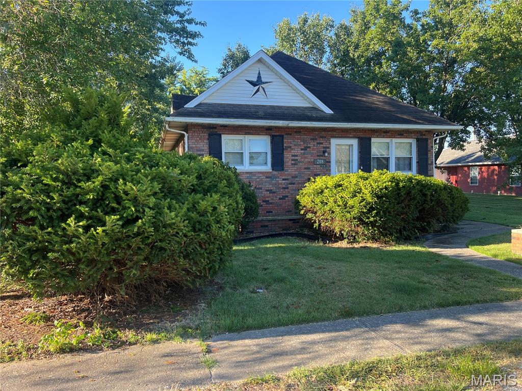 Welcome to your new home!!! This beautifully maintained 2 bedroom, 1 bath 1134 square foot brick home has been waiting for you!! A fenced in backyard with patio space for that outdoor comfort!! A large detached 2 car garage offers great parking out of the elements as well as great space for hobbies! Plenty of storage  in the garage to make the most of your space in the home!! Main floor laundry for that easy and convenience! An open floor plan in the living and dining room gives all the room needed for hosting! With a kitchen large enough to have your daily meals! See all that your new home has to offer today!! Call your favorite agent to schedule your showing today!!