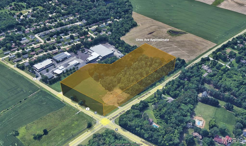 Outstanding Commercial Development Opportunity! 9.57+/- acres located at the signalized corner of N. Green Mount Rd. & Lebanon Ave in Shiloh, IL. Zoned General Business (B-4) with approx. 925’ of frontage on Green Mount and 482’ on Lebanon. Excellent visibility with high traffic counts—over 27,000 vehicles daily. Just 2 miles from I-64 (Exit 16) and minutes from Scott AFB. Surrounded by retail, healthcare, and residential growth. Ideal for retail, gas station, medical, or mixed-use development. Sale Price: $1,895,000.