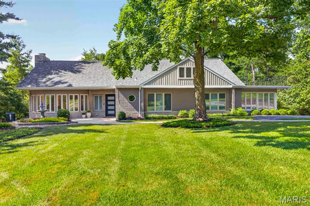Great new price! Welcome to this spectacular luxury one-and-a-half-story home, where timeless elegance meets modern comfort. Designed with an expansive open floor plan and filled with natural light, this stunning residence has been renovated with exquisite updates throughout. The heart of the home is the spectacular chef's kitchen, featuring luxurious hard-surface countertops, massive center island, custom cabinetry, and high-end stainless-steel appliances. The kitchen flows effortlessly into the spacious dining area and impressive great room, creating the perfect space for both everyday living and entertaining. Just beyond, the inviting family room offers gorgeous new custom built-ins and a striking stone fireplace, all while capturing breathtaking views of the private, wooded backyard. Seamlessly blending indoor and
outdoor living, the newly added screened porch and expansive deck provide the perfect setting to enjoy
your morning coffee, unwind with a glass of wine, or entertain guests while surrounded by nature.
The main-level primary suite is a true retreat, complete with a spa-inspired bathroom, a private
wet bar, and an incredible walk-in closet and dressing room featuring newly designed custom built ins. A
convenient main-floor laundry room adds to the home's thoughtful design. Upstairs, you'll find three generously sized bedrooms, including one suite with its own private second-floor patio overlooking the 1.2 acres of low maintenance woods. An adorable playroom offers the perfect space for play, homework, or creative pursuits. The finished lower level expands the living space with a large family room and recreation area, a full bathroom, and abundant storage. Outside, the beautifully landscaped backyard is a peaceful private oasis with mature trees creating exceptional privacy. Whether relaxing on the screened porch or entertaining on the deck, you'll appreciate the serene setting year-round. Completing this remarkable property is a spacious three-car garage and an unbeatable location close to shopping, dining, parks, and top amenities. Offering luxury finishes, exceptional living spaces, and a setting that's both private and convenient, this extraordinary home truly has it all.