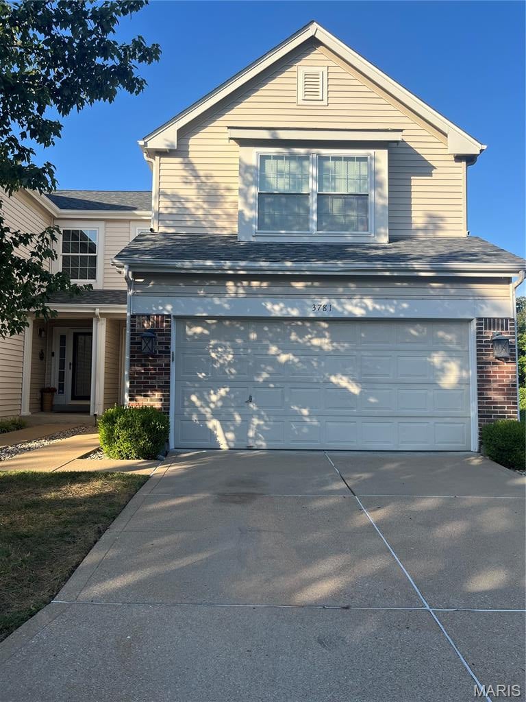 Welcome to the Southern Manor Community!  This move-in villa has many updates.  Finished basement with walk-out.  New roof installed in 2025.  New carpet in Master Bedroom and Basement installed in August 2026.  Freshly painted main floor including foyer and hall upstairs and primary bedroom in August 2026.   Renewal by Anderson windows installed in 2022 in Living room and kitchen.  New sliding glass doors and window installed in basement in 2022.   Water heater installed in 2022.  New carriage lights installed in 2021.  Deck painted in August 2026.  This villa has 1.774 square feet.  The large kitchen features granite countertops, breakfast bar, pantry, white cabinetry lots of counter space, stainless steel appliances and main floor laundry.  Sliding door in dining room leads to a covered porch.  Gas fireplace in living room with fireplace surround and mantle.  The Primary bedroom is very large and features a walk-in closet and oversized shower in Primary bathroom.   Refrigerator, washer and dryer staying with property in "as is" condition.  This villa has zoned heating and cooling.  The basement level features a finished family room and lots of storage.  The lower-level sliding doors lead to a covered patio.  The HVAC is around 11-12 years old.  This villa is close to shopping and easy access to Highway 55 and I-270.