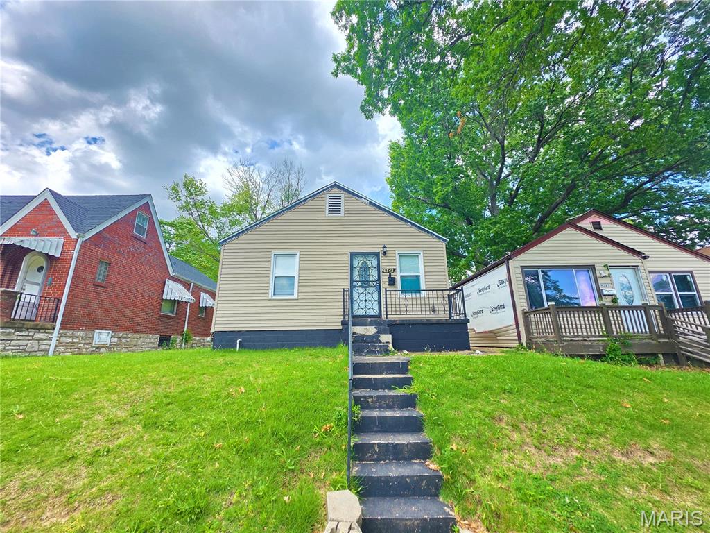 Fully Renovated Two Bedroom, One Bath Home Featuring:  Updated Energy Efficient Vinyl Windows, Luxury Vinyl Plank Flooring, Newer Fixtures, Built-In Lighting, Newer Furnace & Hot Water Tank, Updated Electric & Plumbing Supply Lines, Maintenance Free Vinyl Siding, and Upgraded Architectural Shingle Roof. Large Front Porch Entrance leads to Spacious Living Room with Overhead Ceiling Fan Lighting. Rear Eat-In Kitchen with Wall of Cabinetry and Full Set of Appliances to Stay. Two Generous Size Bedrooms share Updated Hallway Bathroom with Ceramic Tiled Shower. Full Unfinished Cinder Block Basement Perfect for Additional Storage. Enjoy the Summer Season from the Fully Fenced Backyard with Parking Pad. Call Your Full Time Realtor for Questions or to Schedule Your Showing Today!