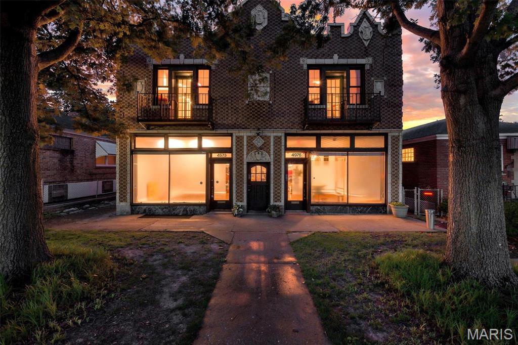 Rare mixed-use commercial/residential investment opportunity! This versatile four-unit property offers exceptional flexibility for investors, owner-occupants, and business owners alike. The building is divided into two sides, each featuring a main-level unit and an upper-level unit.

On the main floor, each side offers a 1-bedroom, 1-bath unit with an eat-in kitchen and flexible commercial or residential zoning possibilities, making them ideal for office, retail, or residential use. Upstairs, each side features a spacious 2-bedroom, 1-bath apartment with a walkthrough bonus room that can easily serve as a third sleeping area, home office, or flex space. The upper-level units also include a comfortable living room and an eat-in kitchen. One of the upper-level units is currently occupied, generating $1,400 per month in rental income, while the remaining three units are vacant, providing the opportunity to establish market rents or create the perfect live/work setup.

Each unit is equipped with its own zoned HVAC system and in-unit washer and dryer. The unfinished basement includes a full bathroom, kitchen, and an additional washer and dryer, offering valuable storage and flexible-use space. Outside, you'll find a detached two-car garage and off-street parking.

Ideally located in a highly walkable South City neighborhood near Kingshighway, you're just minutes from Forest Park, the Saint Louis Zoo, the Saint Louis Art Museum, The Muny, local parks, shopping, dining, and more. This rare property offers immediate income potential with outstanding flexibility for a variety of investment or owner-occupant opportunities.