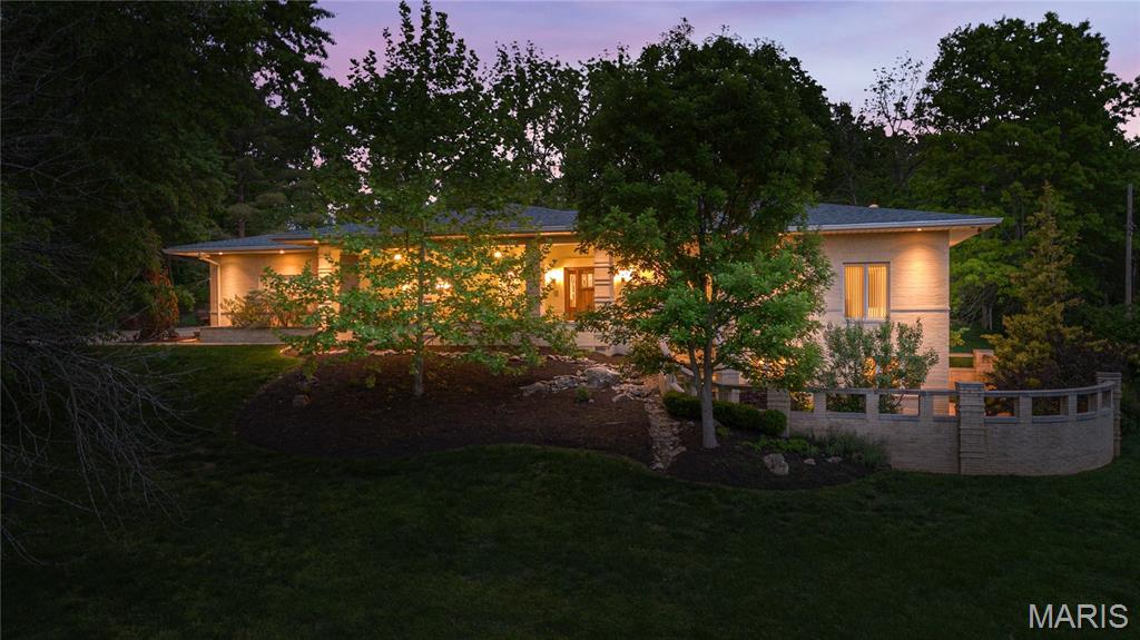 In real estate, the term “luxury” gets tossed around rather loosely. Ask any given broker and they’ll define it using a price point. Sometimes you’ll hear a stat about room count or square footage. But, true luxury buyers understand it isn’t about the price or the number of bedrooms or the lot size… luxury is about quality. Quality of materials, quality of construction, and most of all quality of life. This stunning home, perched above Town and Country’s idyllic Summerhill neighborhood is the embodiment of luxury. It manifests classical elegance and one-of-a-kind craftsmanship… think Frank Lloyd Wright woodworking meets Mission Style architecture that results in a floor plan that would be right out of Southern California with the warmth of a weekend country getaway. Real luxury is comfortable… and quiet… and easy. Real luxury homes are built to a standard the rest only pretend to have. Real luxury is for those who are discerning enough to know it when they see it.