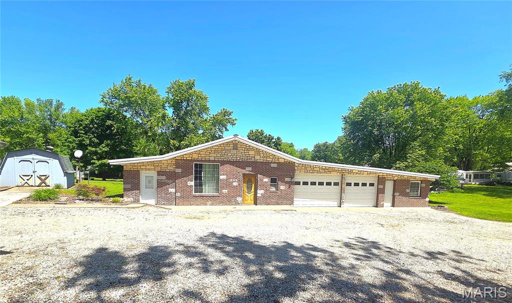 Outdoor lovers paradise for sale in Gascony Village by the Gasconade River!  Located on a park like setting this home sits on SIX LOTS!!!  There's plenty of room for all your toys with an oversized garage, additional camper and boat parking, plus an additional shed!  This unique ranch home has tons of possibilities!  It can be a 1 -3 bedroom home as is, or with some finishing touches it can be a 5 bedroom home!!  It's up to you!  The heart of the home is the large kitchen with tons of rooms for family gatherings.  With the breakfast room on one side and the living room (complete with fireplace) on the other side, this space is wonderful for summer days or cozy winter evenings.  There are 2 rooms off the kitchen with their own entrances!  They could be bedrooms, enclosed patios, play rooms, get creative and make them your own! The entry foyer has plenty of room for a computer desk - but who wants to work at the river?  Then there's a large master bedroom OR this area can be a second living room.  Bathroom has 2 counters and 2 doors, one door leads to the back yard, so convenient for camper access or messy dogs/children . The laundry room is so big that currently there's a bed in it with plenty of space for laundry.  Completing this home is a huge oversized garage with additional storage and even 2 more rooms - make them bedrooms, rec rooms, storage, man/woman cave, there are tons of options!  
 
Plus the location, location, location!!!  Gascony Village close to the wineries and right on the Gasconade River.  This community has it all! Enjoy jet skiing, boating, 4 wheeling, swimming, and bonfires or cookouts with neighbors. Celebrate holiday weekends with events including kids cake walks, golf cart parades, washer tournaments, poker runs, booze walks for the adults, basket raffles, bingo, live bands and friends galore! 

Check out all the community amenities: 
 - Huge Swimming Pool with Bathrooms and Shower House
- Private Boat Launch and Beach on the Gasconade River
- Private Fishing Lake
- Private Gravel Roads
- Club house
- Covered Pavilions
- Playground and Sand Volleyball


Sorry there are no rentals/Air B and Bs allowed in this community.  This community is private for owners users only, rentals are prohibited.